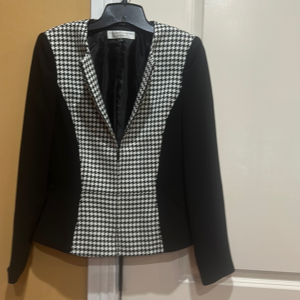 Tahari Levine Studio  blazer in new condition.  Very classy.